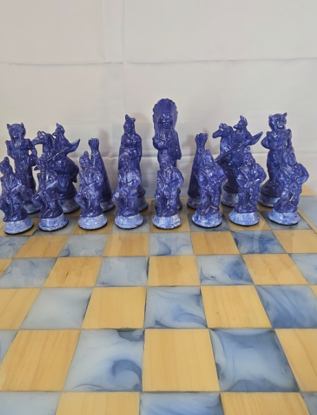 Cowboy and Indian Chess Set with wood and resin board.