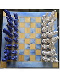 Cowboy and Indian Chess Set with wood and resin board.